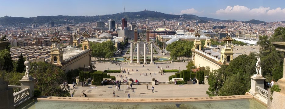 Plaza de Espana and Venetian towers on Montjuic in Barcelona in Spain. Placa Espanya is one of the most important and well-known squares in Barcelona. It is placed at the foot of Montjuic mountain.