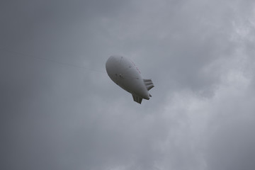 Group of multicolored helium filled balloons in the sky
