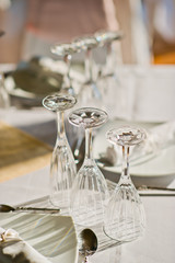 restaurant glass of water on table / dish and spoon