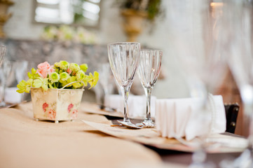 restaurant glass of water on table / dish and spoon
