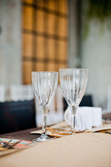 restaurant glass of water on table / dish and spoon