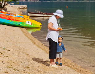 Grandmother holding grandson's hand