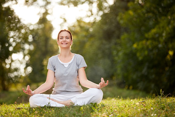 Female in yoga pose in nature