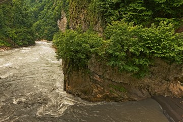 Fototapeta premium View of the rugged mountain river Mzymta