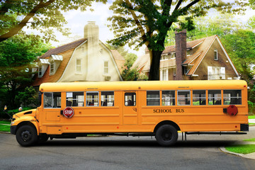 Yellow school bus on the city street © Zarya Maxim