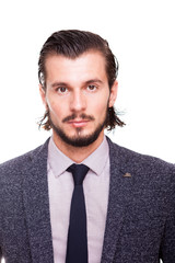 Confident smiling businessman in formal wear isolated over white background in studio photo