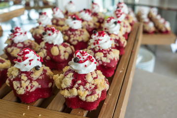 berry muffin on the wooden tray