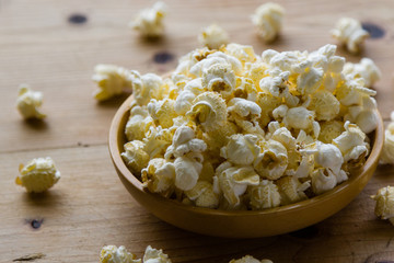 popcorn in wooden bowl