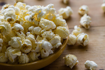 popcorn in wooden bowl