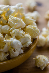 popcorn in wooden bowl