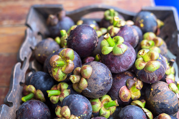 fresh mangosteen of Thailand, Thai fruit on wood plate