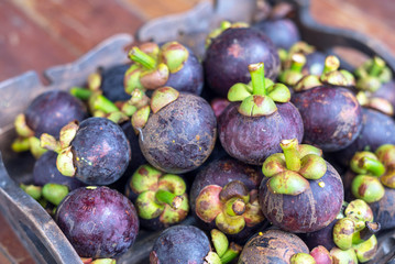 fresh mangosteen of Thailand, Thai fruit on wood plate
