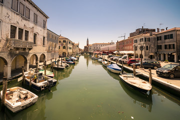 Characteristic canal in Chioggia, lagoon of Venice.