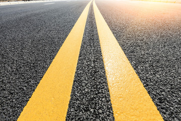 New asphalt road texture background closeup