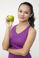 woman holding an apple