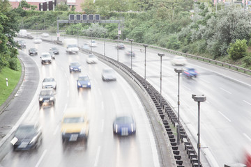 Autobahn cars high speed traffic at rush hour in Berlin