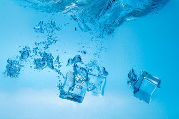 Pieces of ice in water