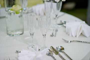 restaurant glass of water on table / dish and spoon