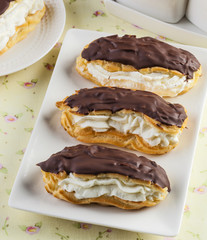 Homemade eclair choux pastry with chocolate.
