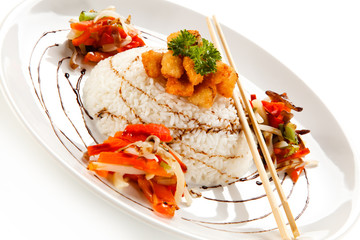Chicken nuggets with rice on white background 