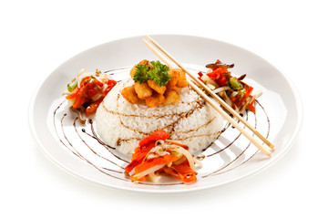 Chicken nuggets with rice on white background 