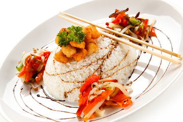 Chicken nuggets with rice on white background 