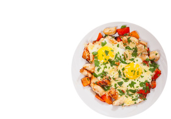 fried eggs with chicken breast, pepper and cheese. top view. isolated on white