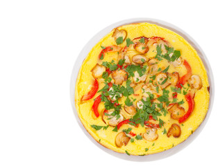 omelet with mushrooms, and vegetables. top view. isolated on white