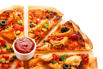 Pizza with chicken and vegetables on white background