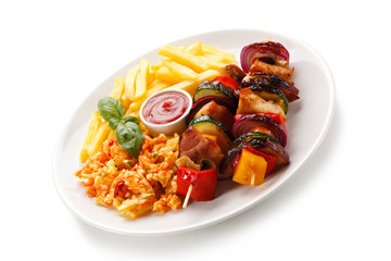 Kebabs - grilled meat and vegetables on white background 