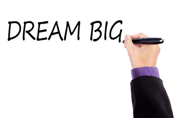 Businessman writing a text of dream big