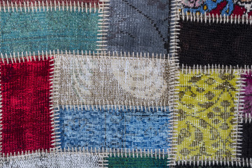 Texture of a piece of old carpet to sew thick threads 