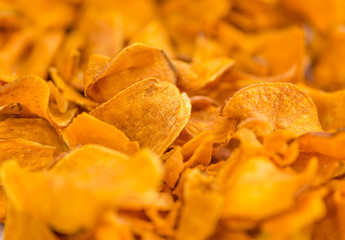 Portion of Sweet Potato Chips , selective focus