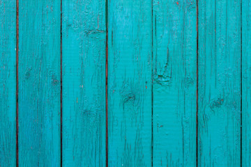 Texture of old wood with worn green paint