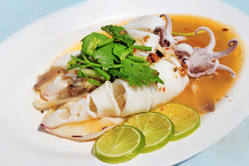 Thai recipe : Squid in lime sauce -  selective focus