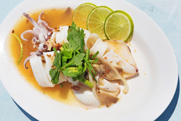 Thai recipe : Squid in lime sauce -  selective focus