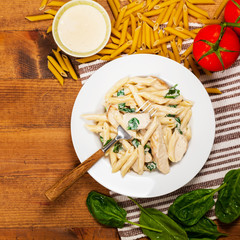 Chicken Alfredo Spinach Parmesan Pasta. Selective focus.