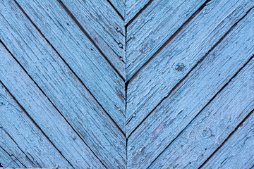 Texture of old wood with worn blue paint