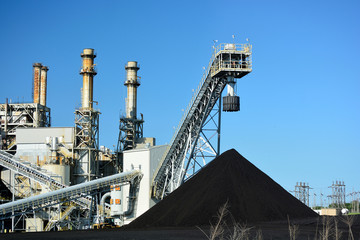 Coal Power Plant and a Large Pile of Coal