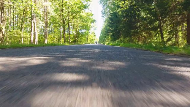 Motorcycle on the rural road from drone in Czech Republic