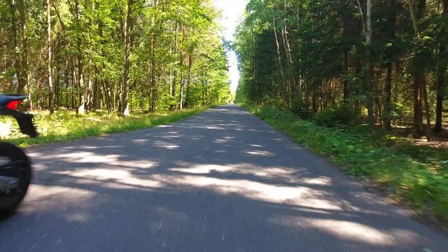Motorcycle on the rural road from drone in Czech Republic