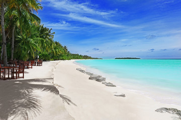 View of sea beach at tropical resort in summer day