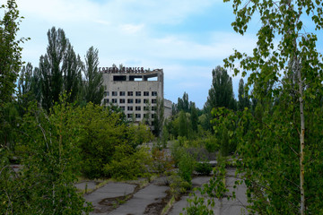 Fototapeta na wymiar Polissya hotel, one of the tallest building in Pripyat, in the exclusion zone close to Chernobyl