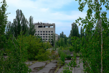 Fototapeta na wymiar Pripyat, the city close to Chernobyl, a view of one of the ruined building