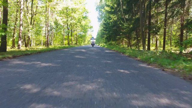Motorcycle on the rural road from drone in Czech Republic