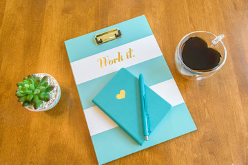 Work it notebook flatlay in turquoise color palette