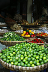 assortment of green lemon sold in asian market