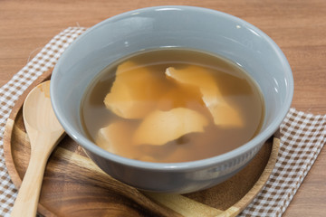 soybean curd and hot ginger juice on bowl