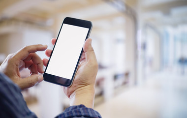 Businessman using Smartphone. Blank screen mobile phone for graphic display montage.