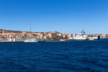 Fototapeta na wymiar La Maddalena, Italy. View of the city and port from the sea side